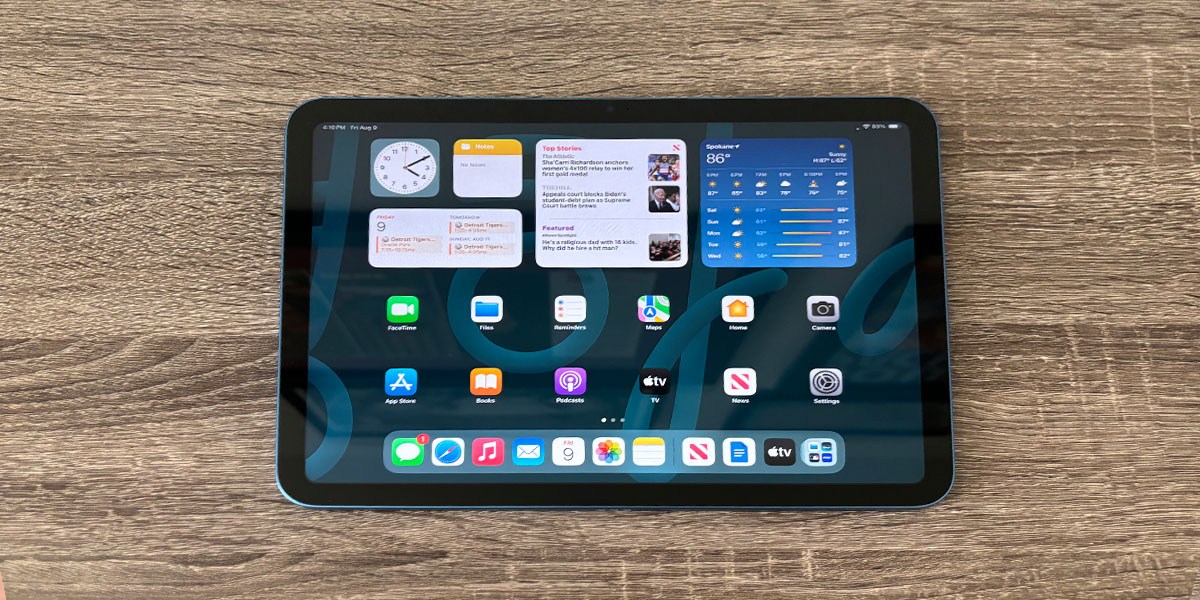 Apple iPad (10th Generation) on wooden background