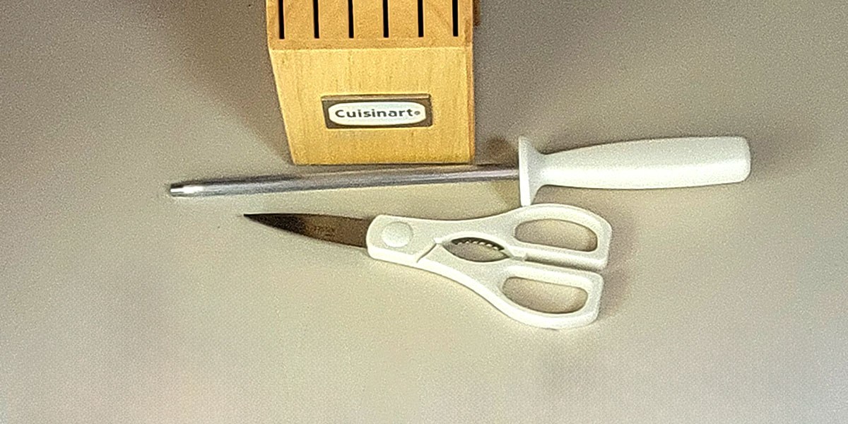 Cuisinart 15-Piece Knife with Block sharpening steel and scissors in front of block on counter Cuisinart 15-Piece Knife with Block sharpening steel and scissors in front of block on counter