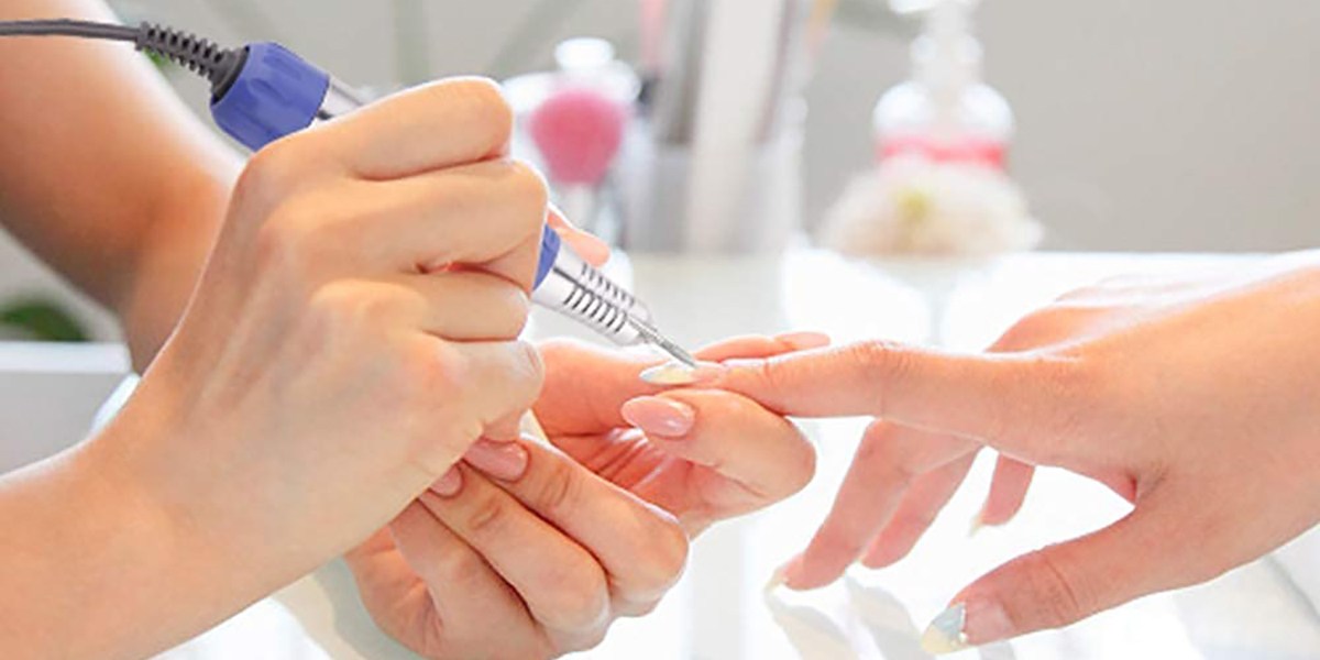 Person using Makartt Nail Drill to give manicure