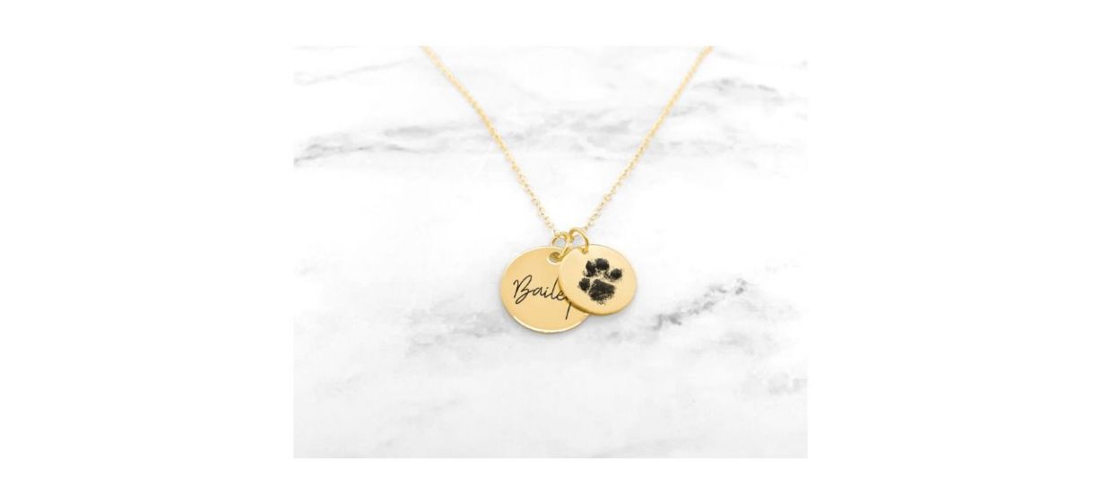 necklace with 2 gold circles with pet's name and pet's pawprint